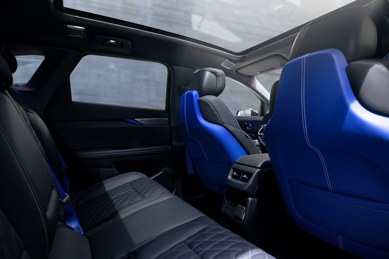 Back Seat View of the 2026 OPTIQ-V Blue Front Seats, Sun Roof, and Interior | Vaden Chevrolet of Hinesville in HINESVILLE GA